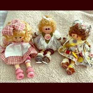 3 adorable button 6” dolls.